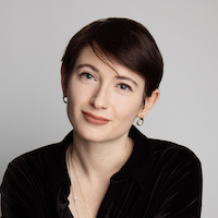 Headshot of EM Lewis-Jong